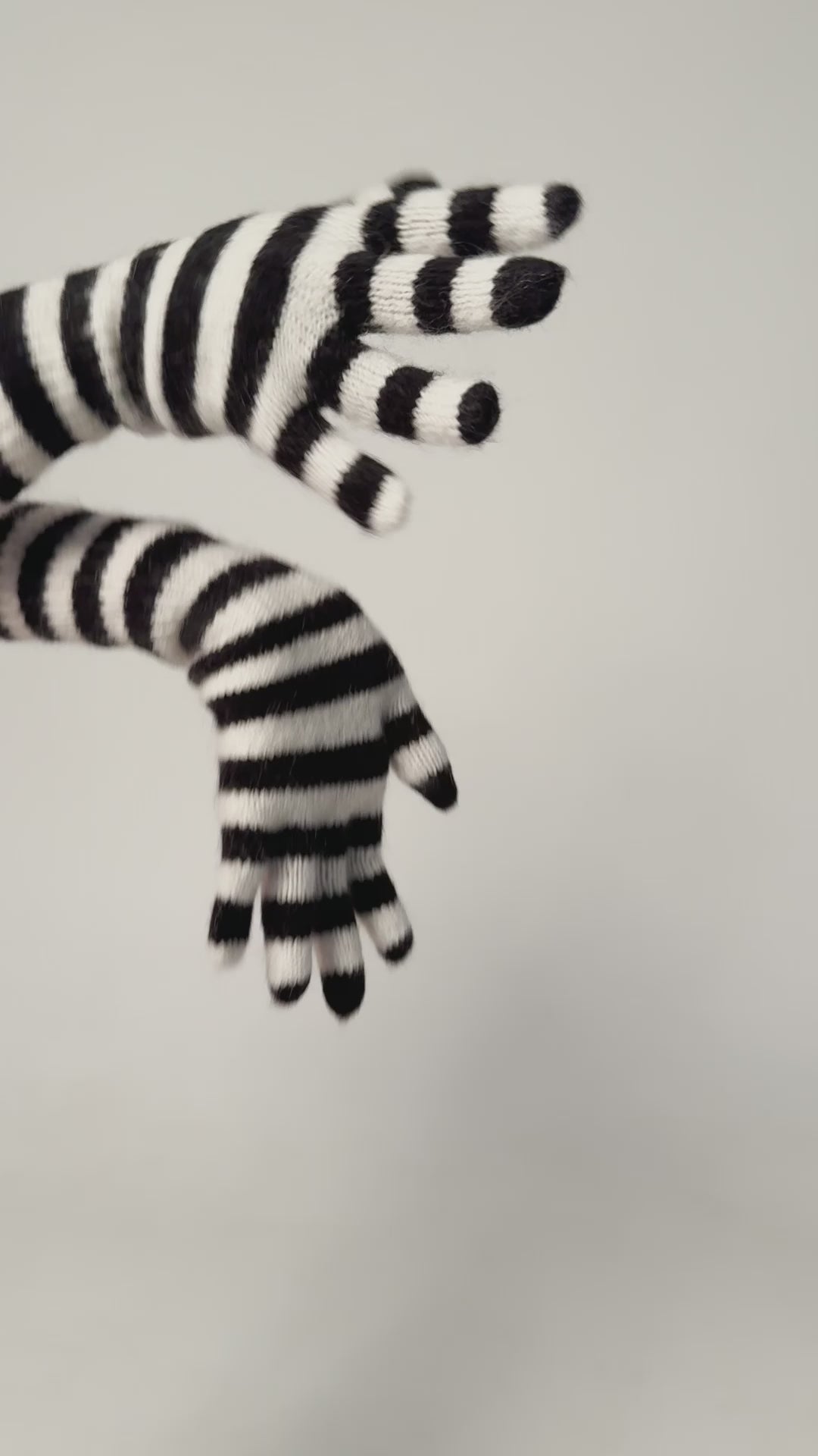 Arthur Apparel black and white striped wooly knitted mittens